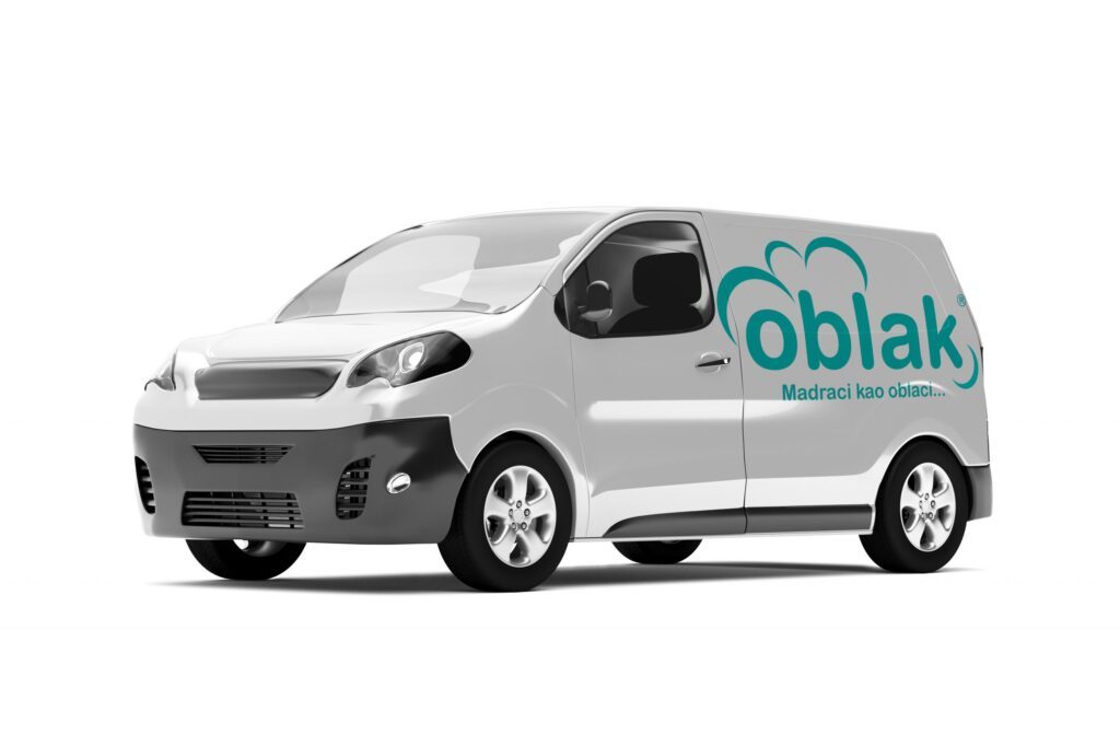 Delivery car with Oblak sign on the back